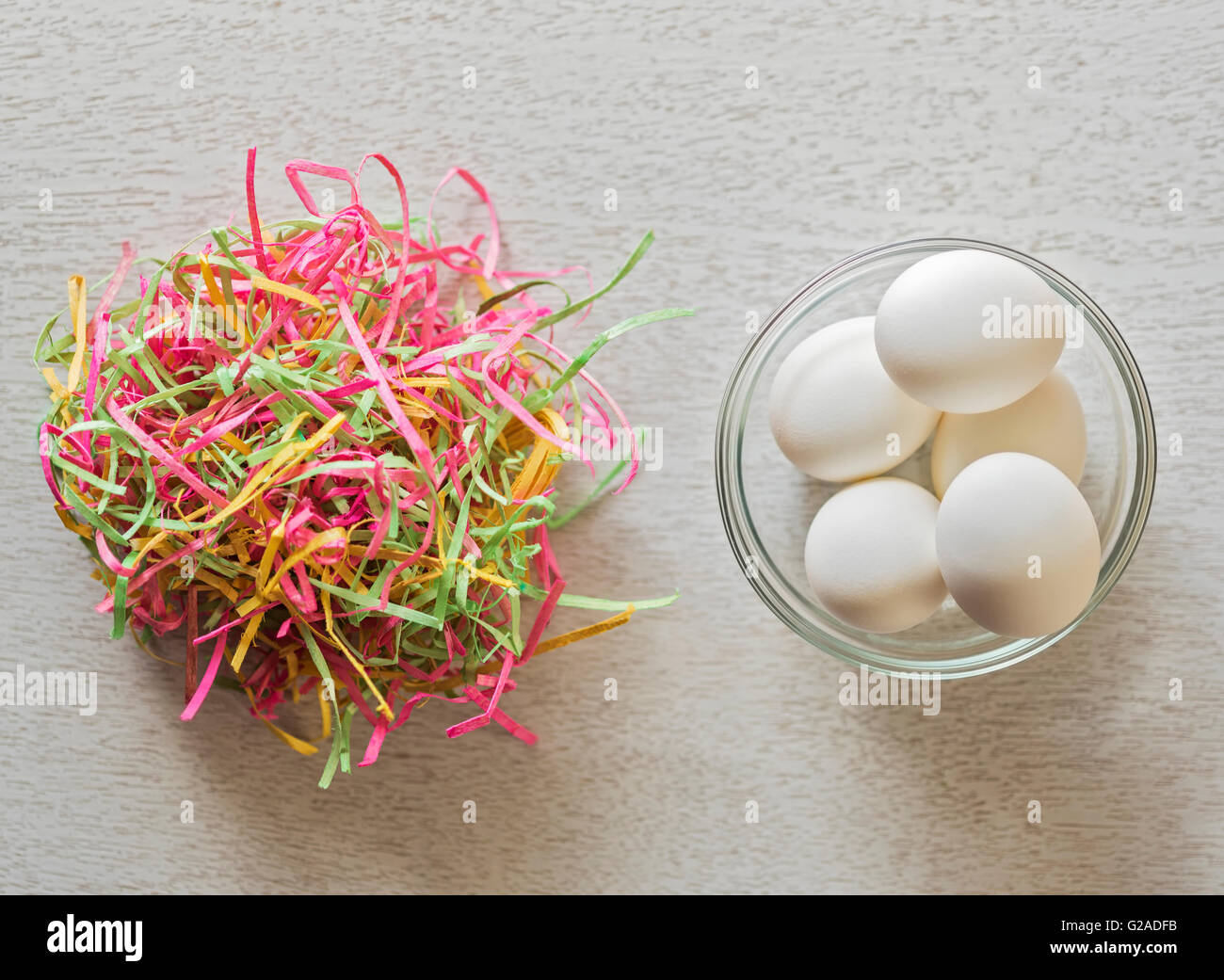Eggs in bowl and colorful streamers Stock Photo Alamy