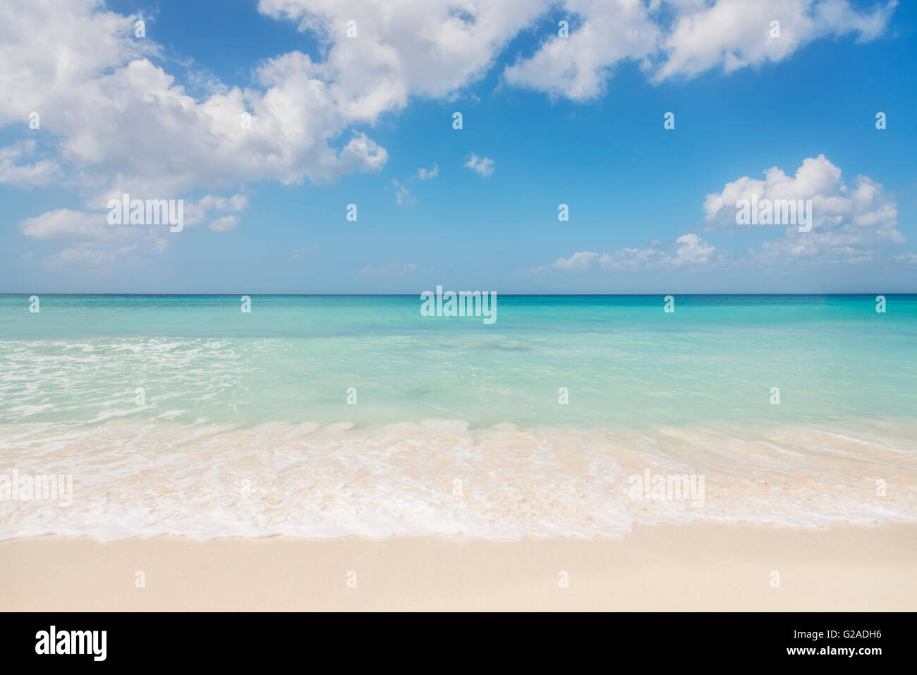 White clouds over tropical sea Stock Photo - Alamy