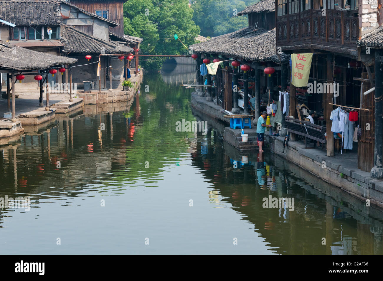 Ancient houses along the Grand Canal in the ancient town of Anchang ...