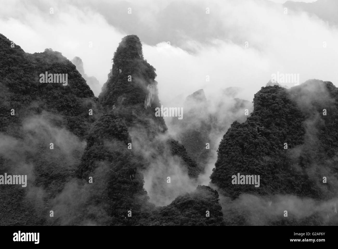 Karst hills in morning mist, Guilin, Guangxi Province, China Stock Photo