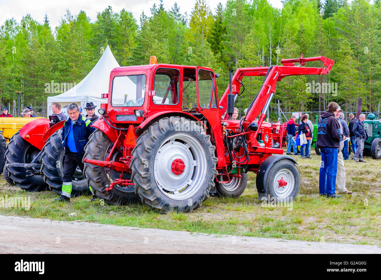 Emmaboda, Sweden - May 14, 2016: Forest and tractor (Skog och traktor) fair. People looking at vintage classic tractors. Here a Stock Photo