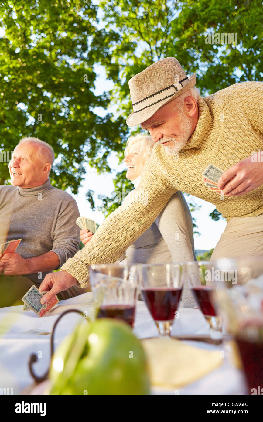 Senior citizens playing cards hires stock photography and images Alamy