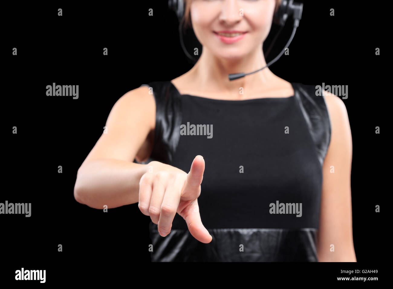 woman pressing high tech type of modern buttons on a virtual background ...