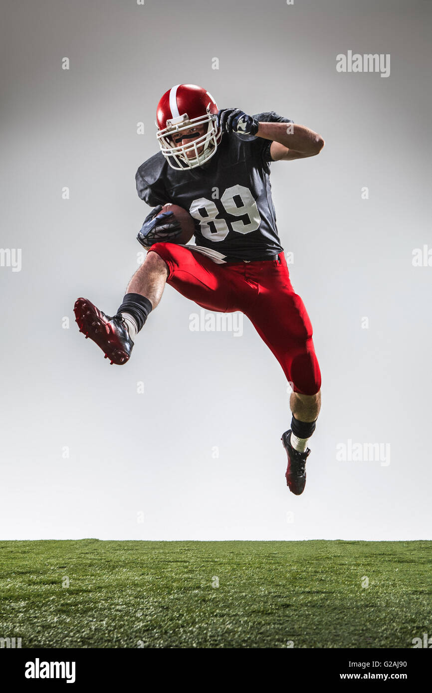 The american football player in action Stock Photo - Alamy
