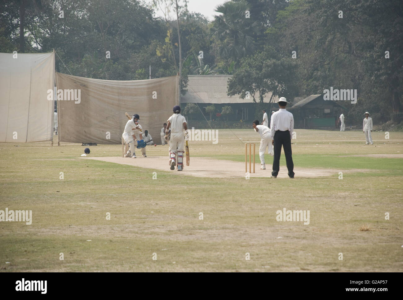 Cricket playing in Maidan area, near Eden Gardens stadium, Kolkata