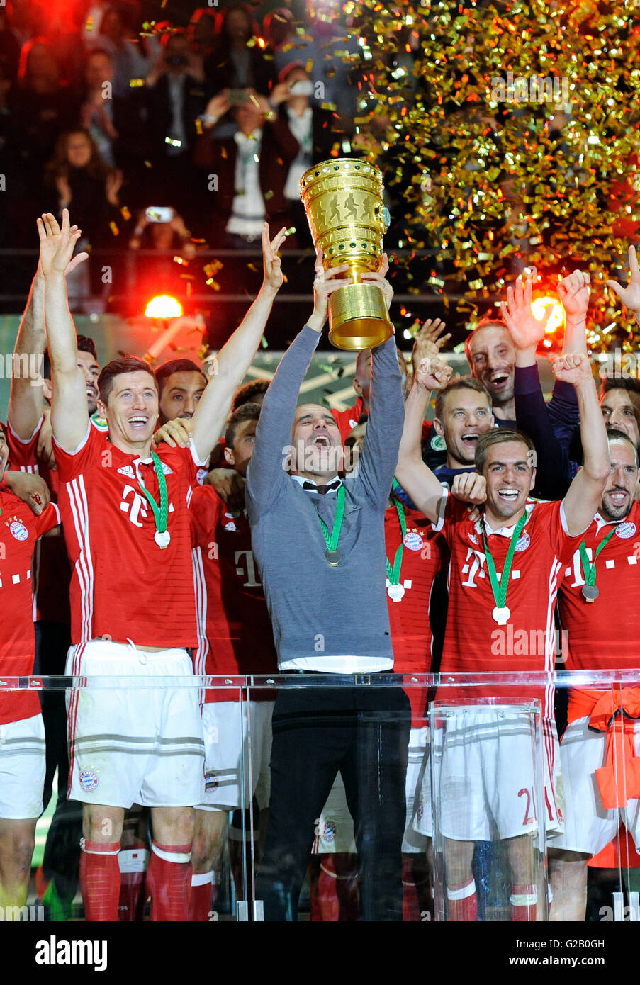German Cup Final, spanish Coach Josep Pep Guardiola from winner Bayern Munich and his team celebrate with the Cup. Stock Photo
