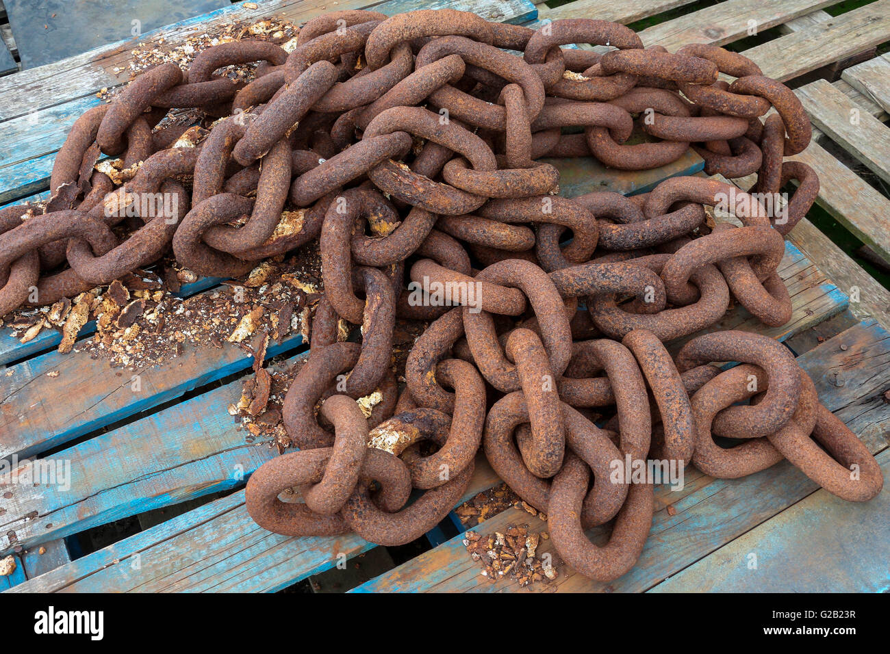Industry - Pile of rusty old chains Stock Photo