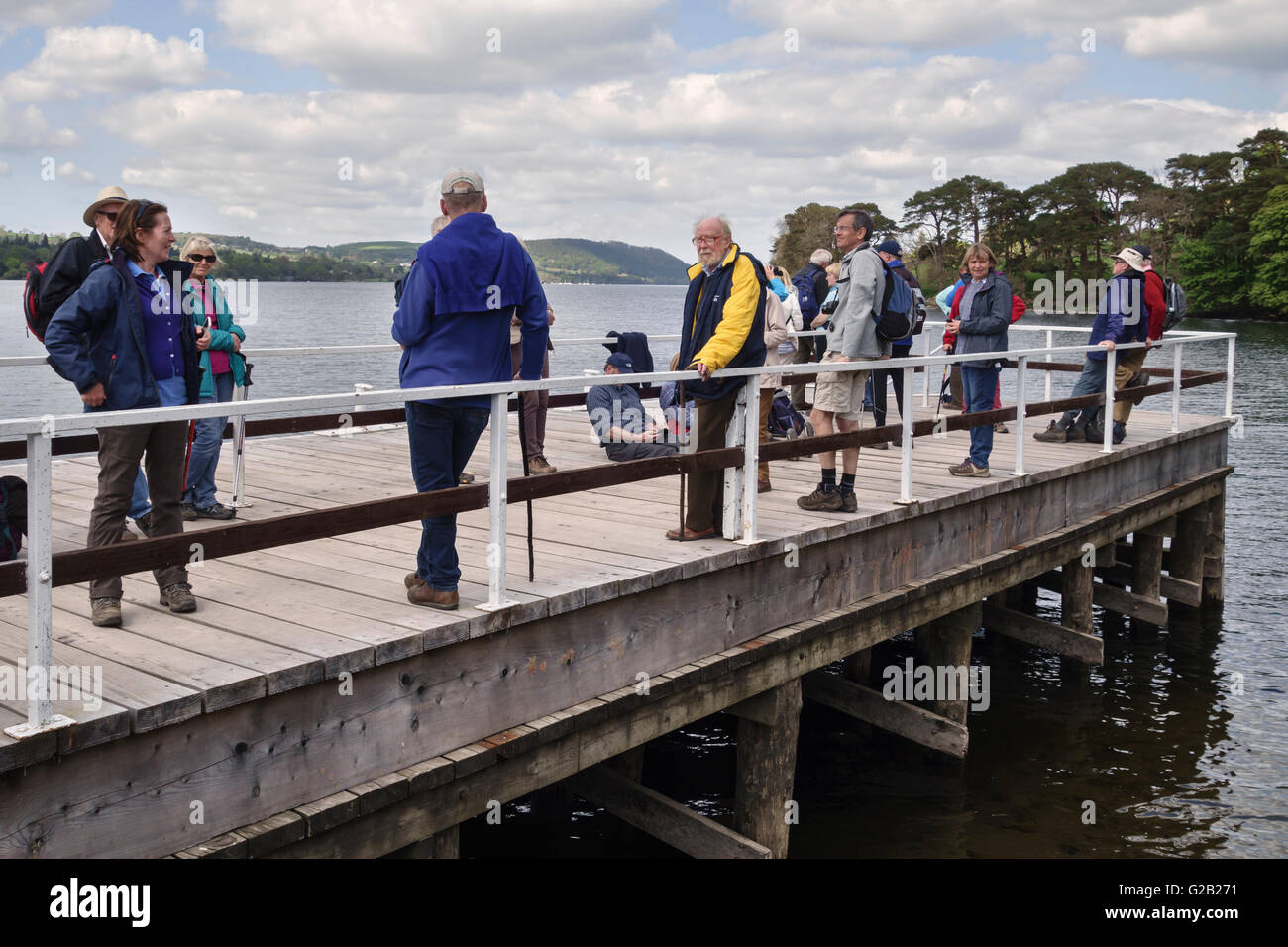 Ullswater (in the Lake District), Cumbria, UK. Passengers waiting at Howtown pier for one of the two old passenger steamers Stock Photo