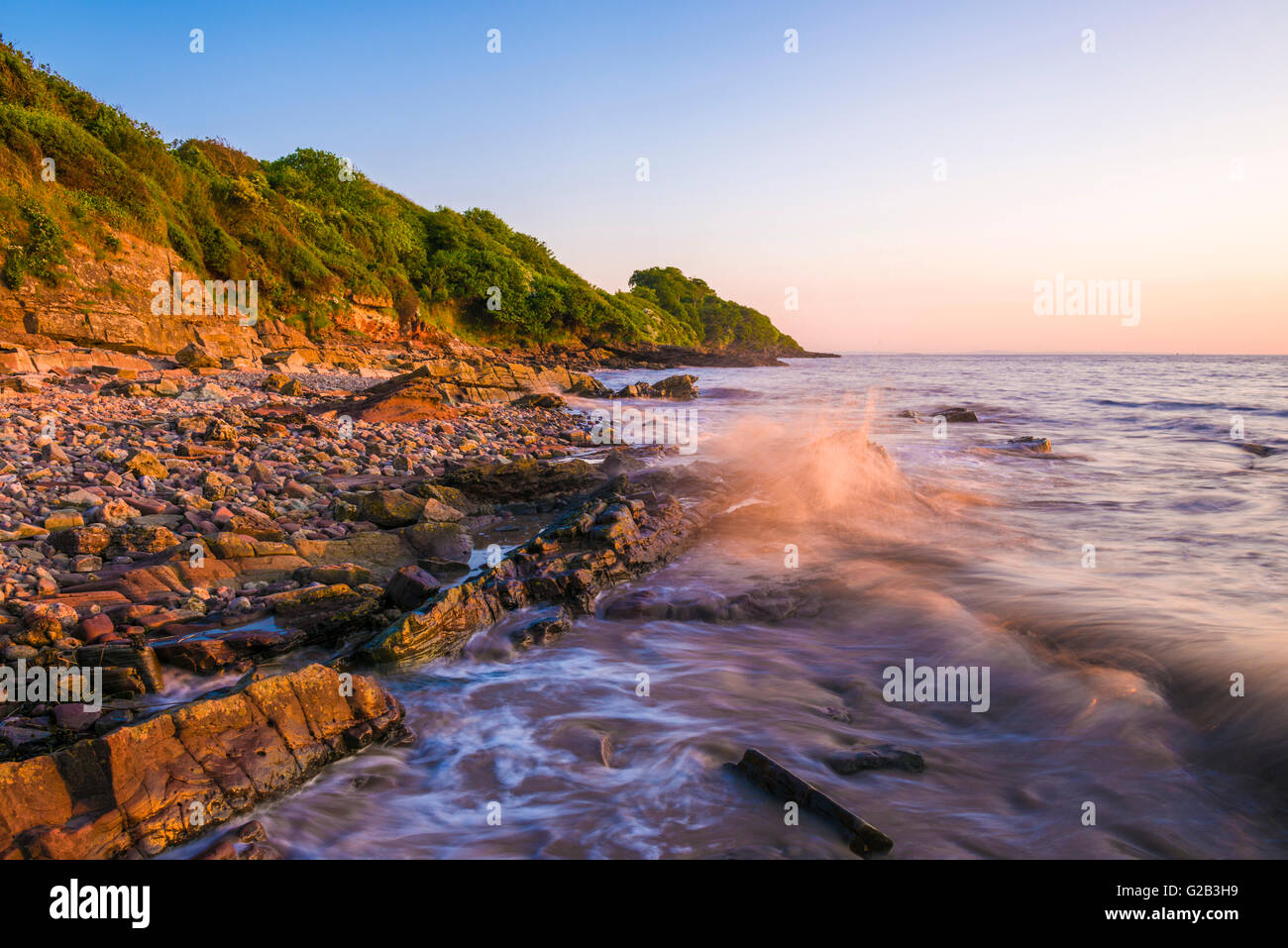 The beach at Black Nore in the Severn Estuary at sunset. Portishead