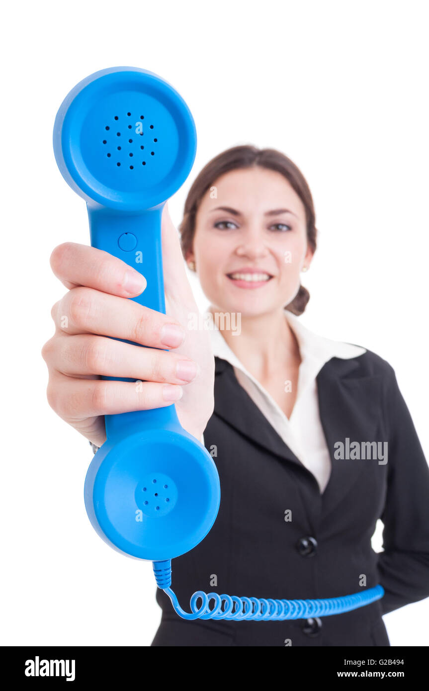 Female contact person showing classic telephone as assistance or ...