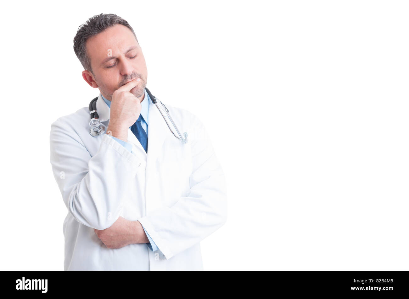 Pensive doctor or medic isolated on white background Stock Photo