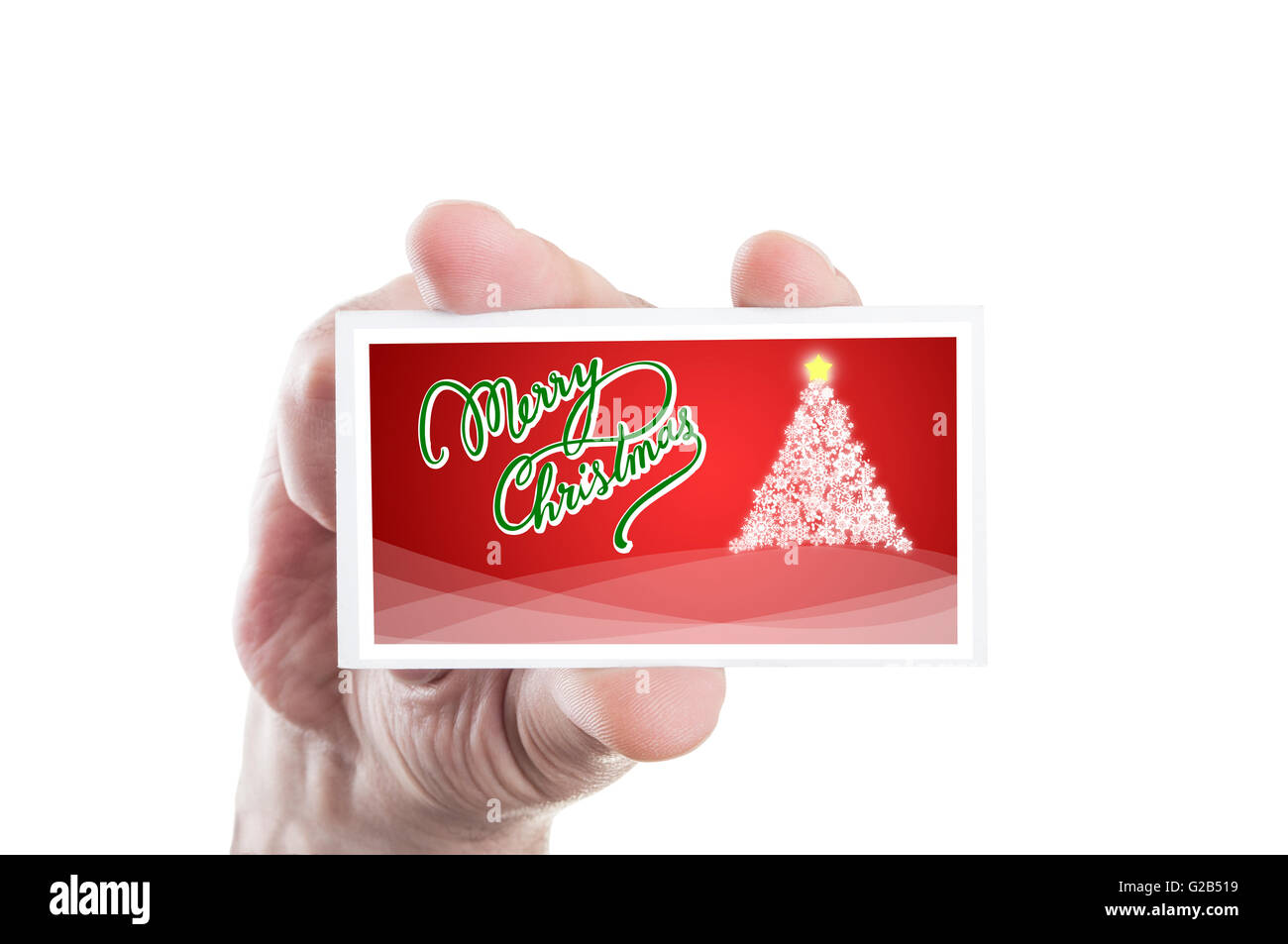 Hand holding red Christmas card isolated on white background Stock ...