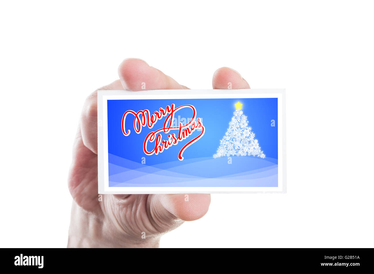 Hand holding blue Christmas card isolated on white background Stock ...