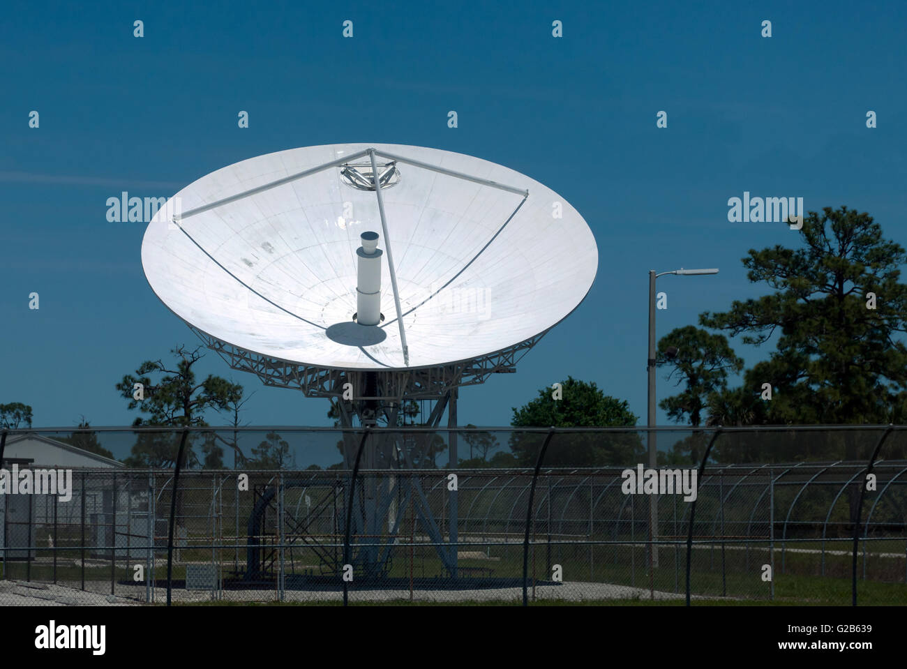 A communications antenna  receiver dish at the  Kennedy Space Centre, Merritt Island, Florida. Stock Photo