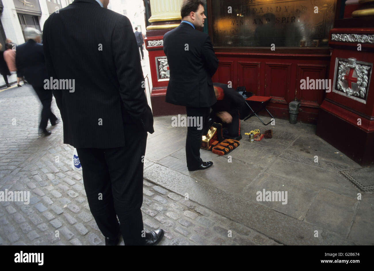UK Great Britain London , shoe shine service for manager, broker, business people in Leadenhall market Stock Photo