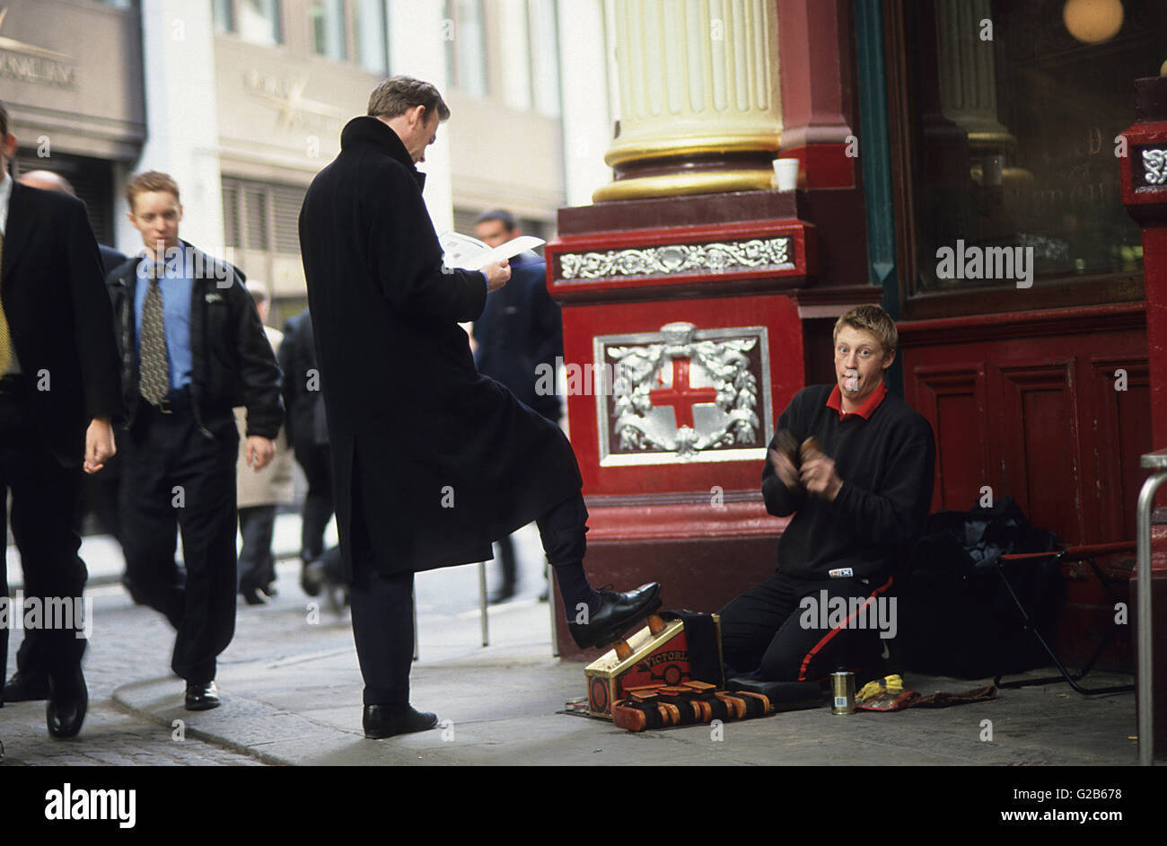 UK Great Britain London , shoe shine service for manager, broker, business people in Leadenhall market Stock Photo