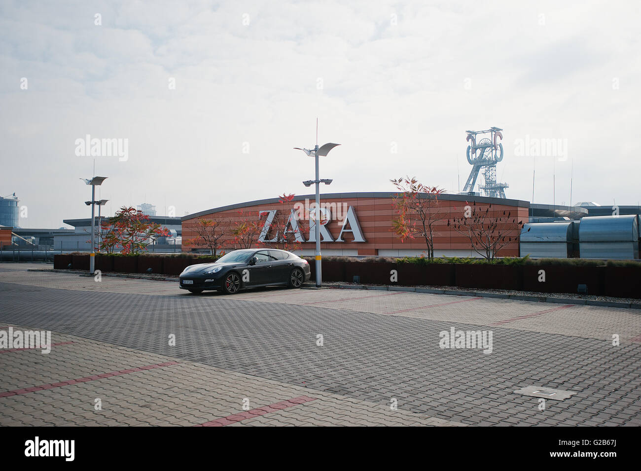Katowice, Poland - October 24, 2014: Super car Porsche Panamera parked  background fashion boutique Zara Stock Photo - Alamy