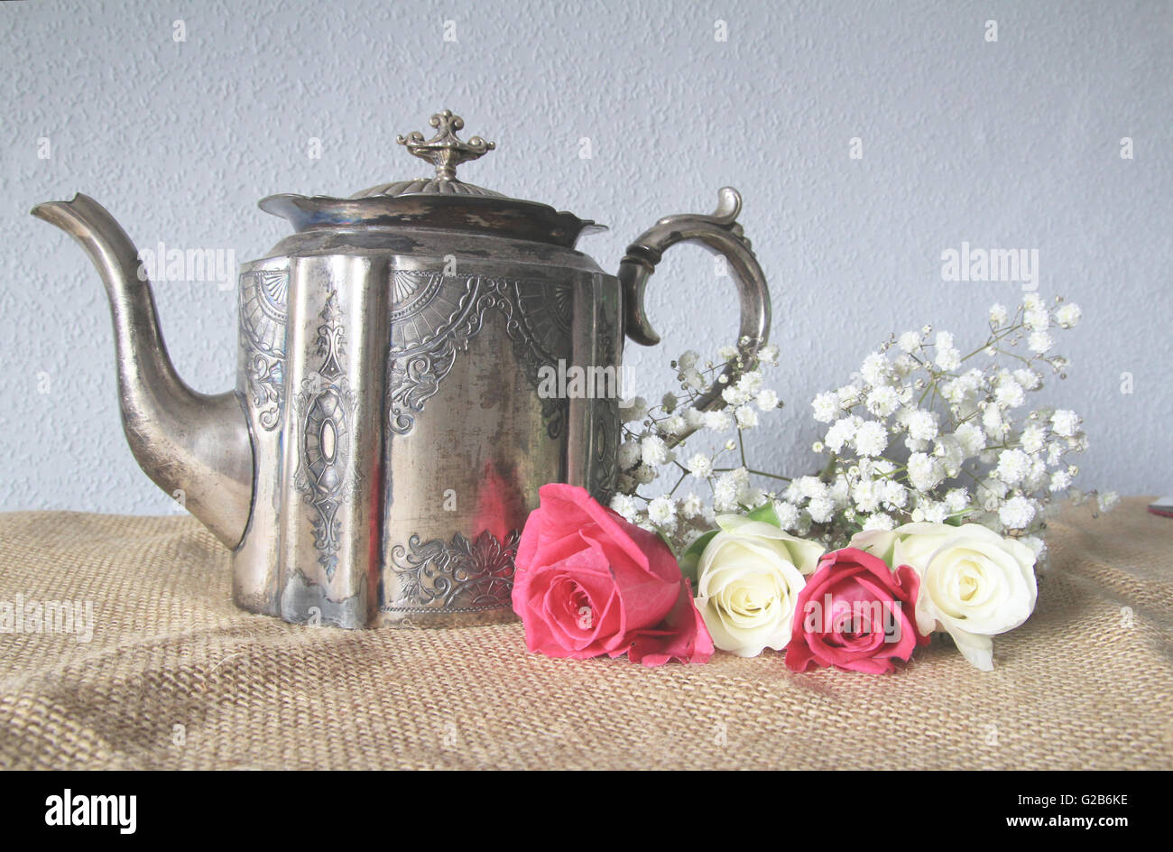 Silver teapot and rose hi-res stock photography and images - Alamy