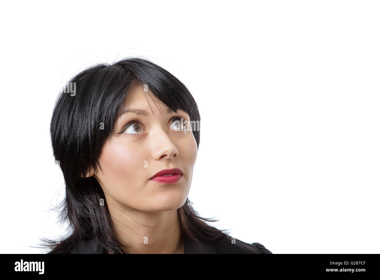 portrait of young business woman looking up with copy space Stock Photo ...