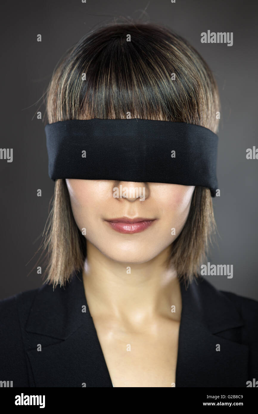 Young Woman Wearing Black Blindfold Isolated On Grey Stock Photo, Picture  and Royalty Free Image. Image 114818746.