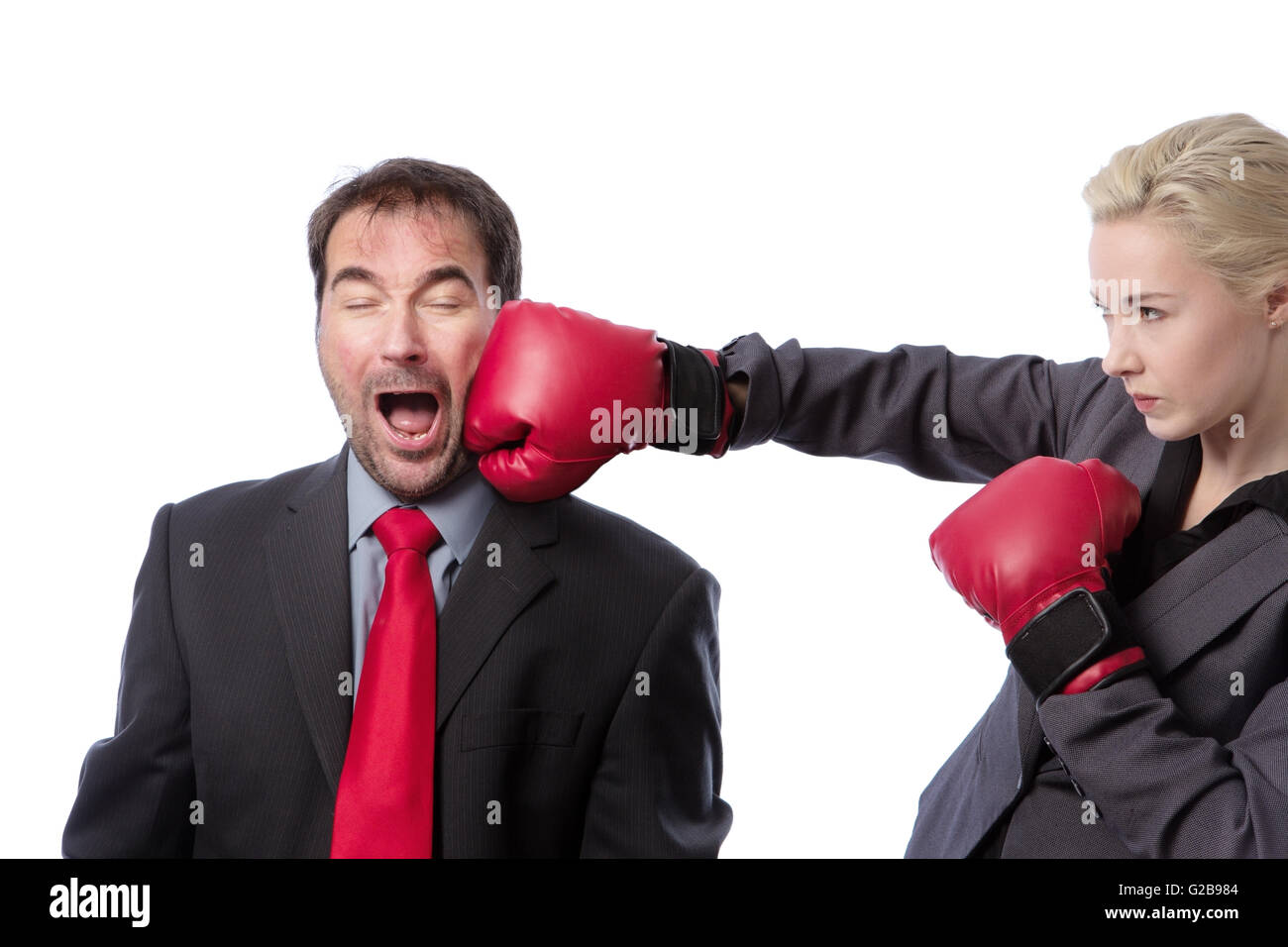 A businessman receiving punch to the side of his head from his co ...