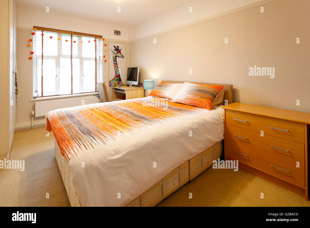 Creighton House, North London. Traditional bedroom with minimal furniture and decoration. Stock Photo
