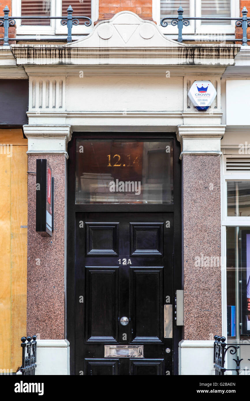 Foley House, Maddox Street. Close view of the door to 12A Foley House. Black classic door. Stock Photo