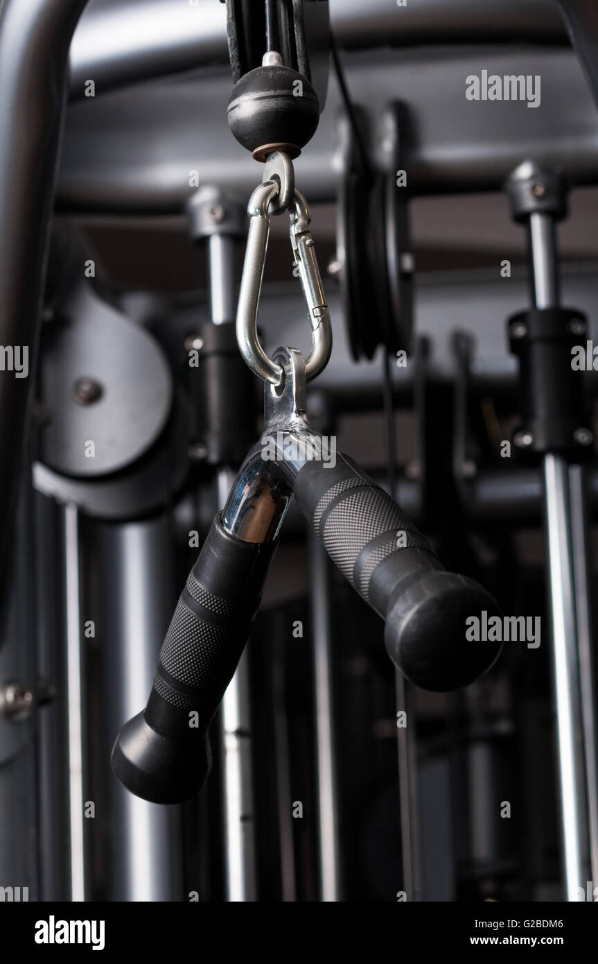 Closeup picture of hanging handle machine in a gym for pulling training Stock Photo