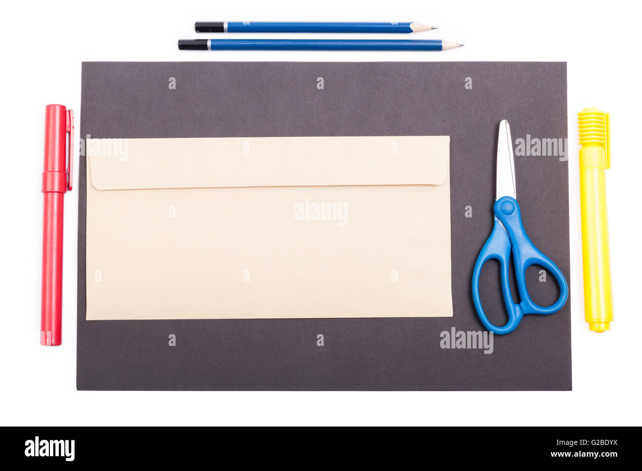 Top view of office supplies and envelop on black paper with copypaste Stock Photo