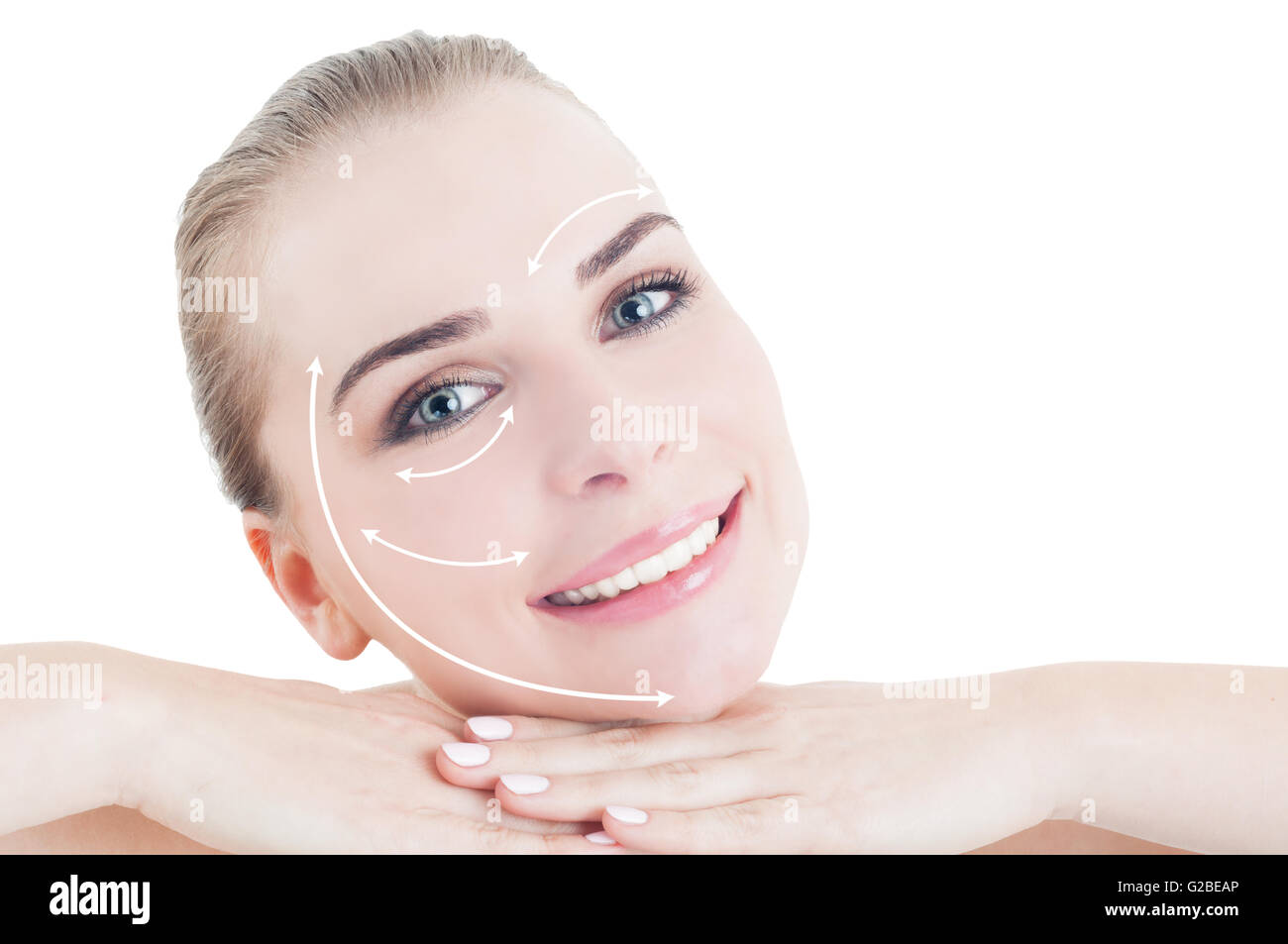 Closeup of attractive young and smiling female face with lifting arrows isolated on white studio background Stock Photo