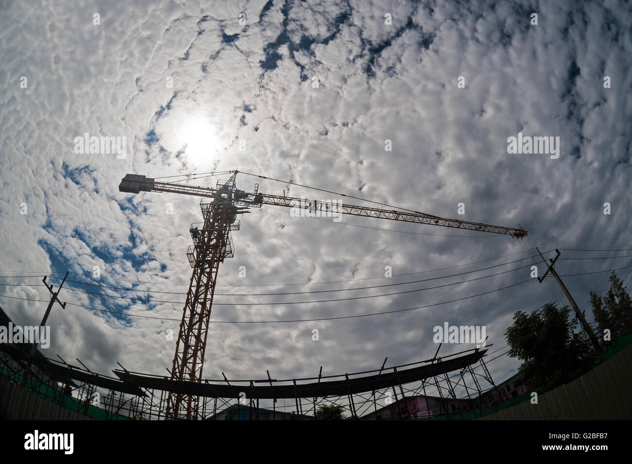 An Crane in construction with blue sky Stock Photo - Alamy