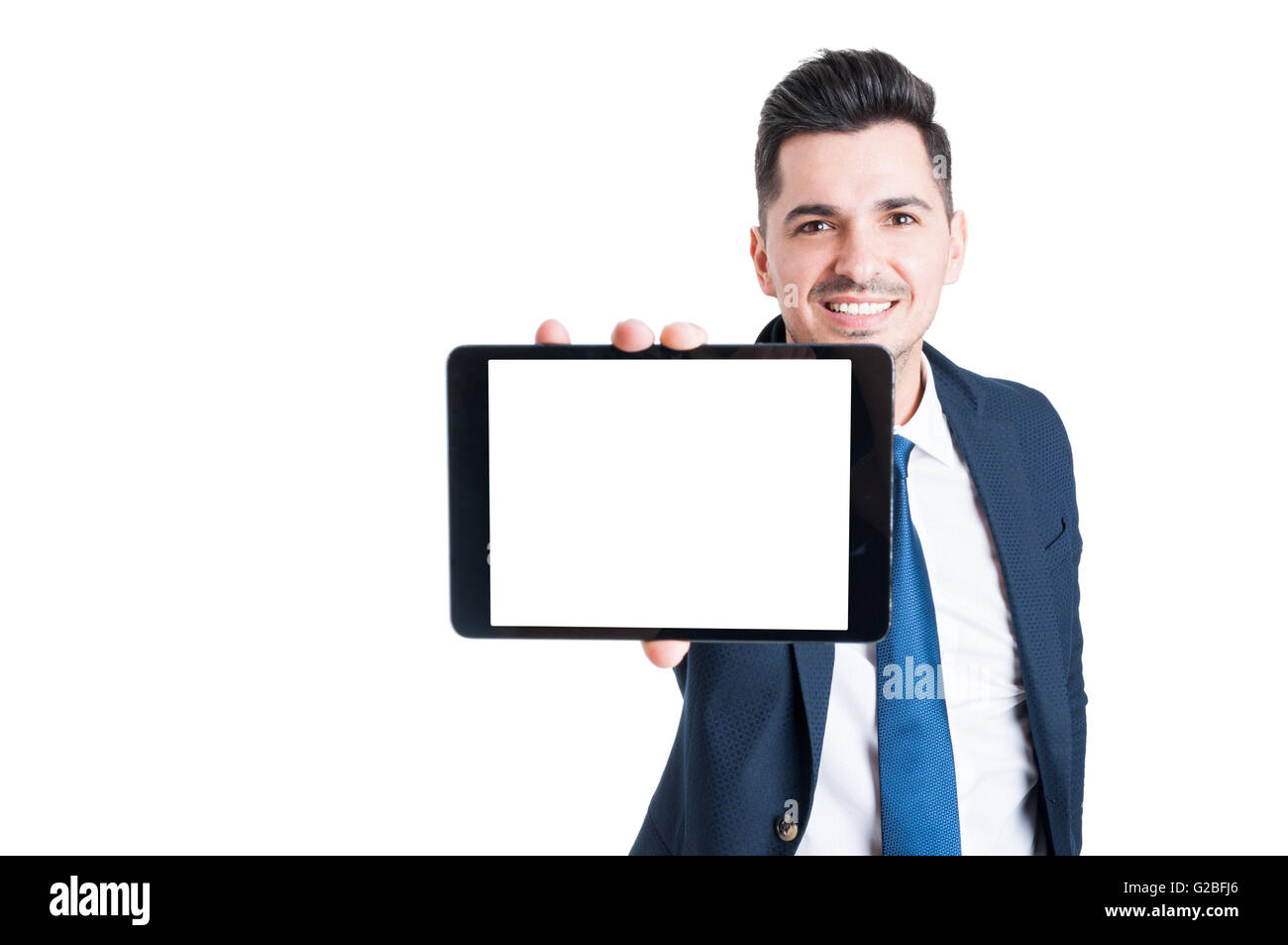Cheerful young businessman shows the screen of modern tablet in close ...