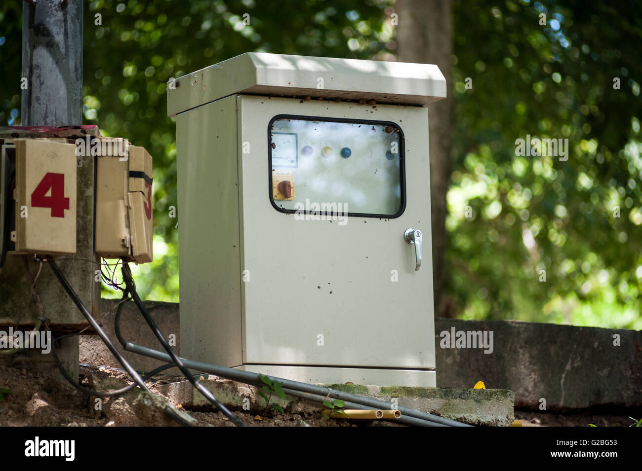 Electric outdoor fuse box in soft light . - Stock Image