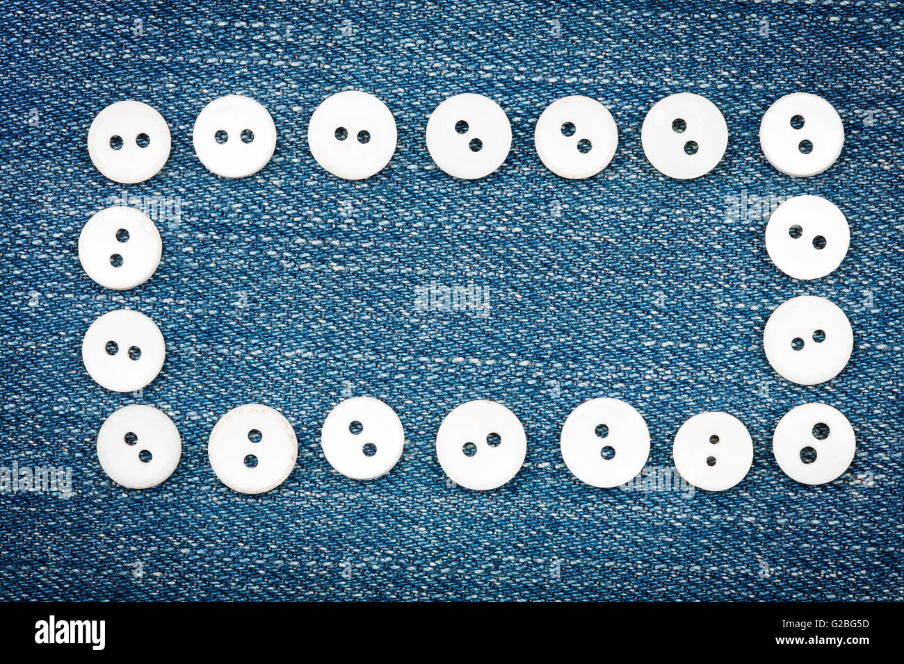 Frame Jeans Button Buttons on blue jeans forming rectangle frame Stock Photo - Alamy
