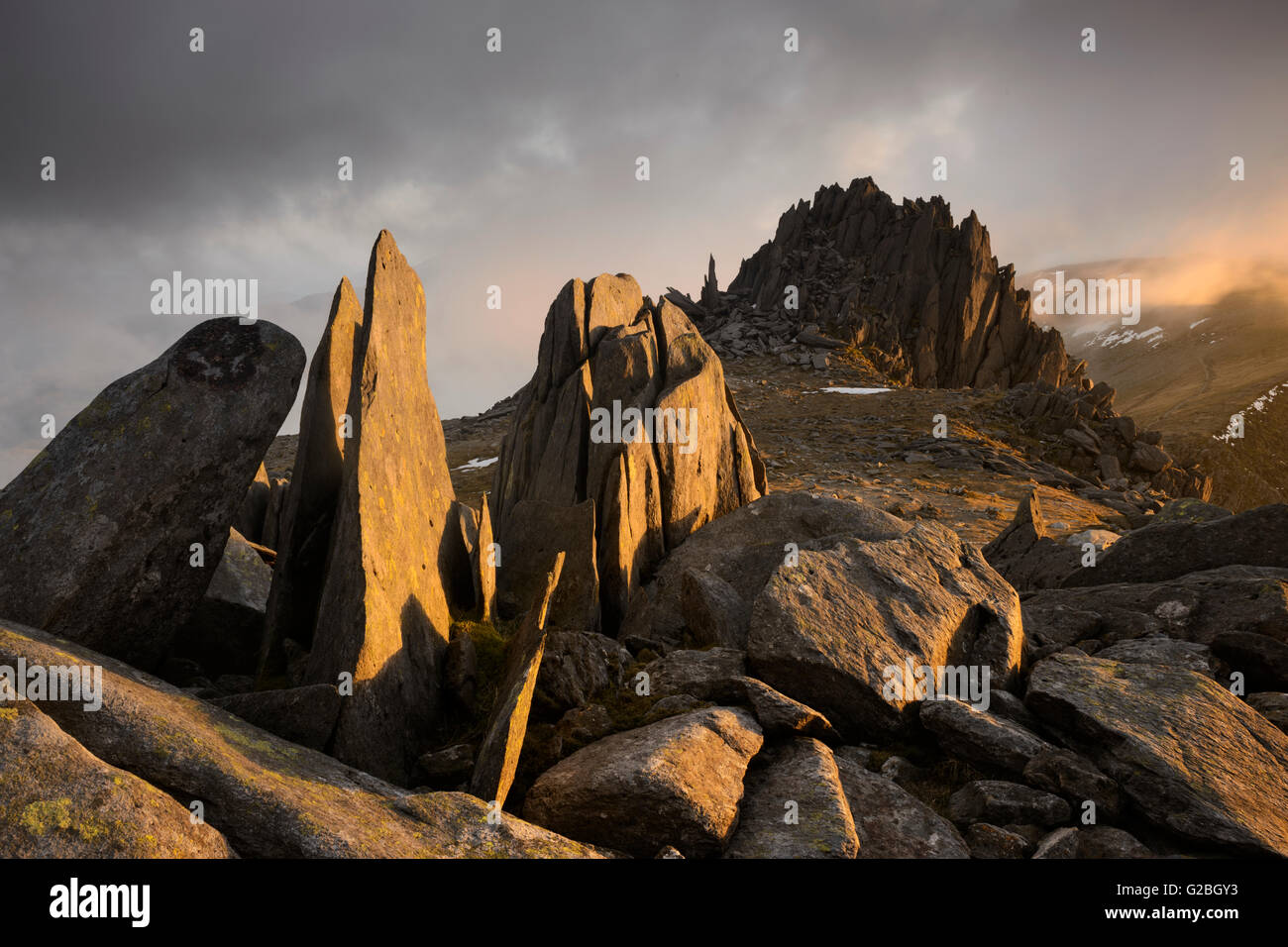 Castell y Gwynt (Castle of the Winds) on Glyder Fach, Snowdonia, dramatically lit at sunset. Stock Photo