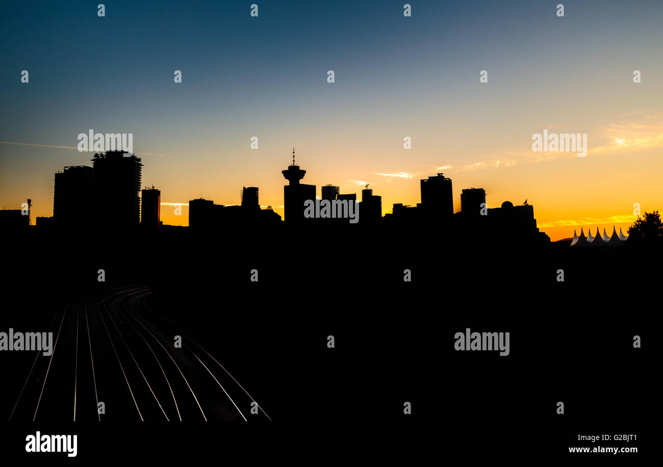 Silhouette of the Downtown Vancouver, Canada skyline at sunset Stock Photo