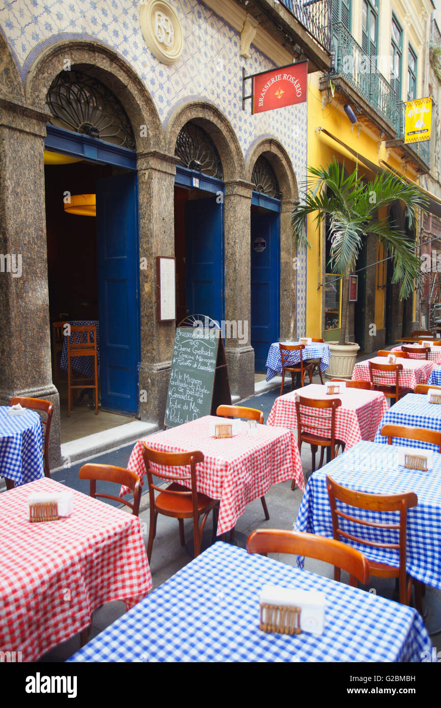 Tables set for lunch at restaurant along Travessa do Comercio, Centro, Rio de Janeiro, Brazil Stock Photo
