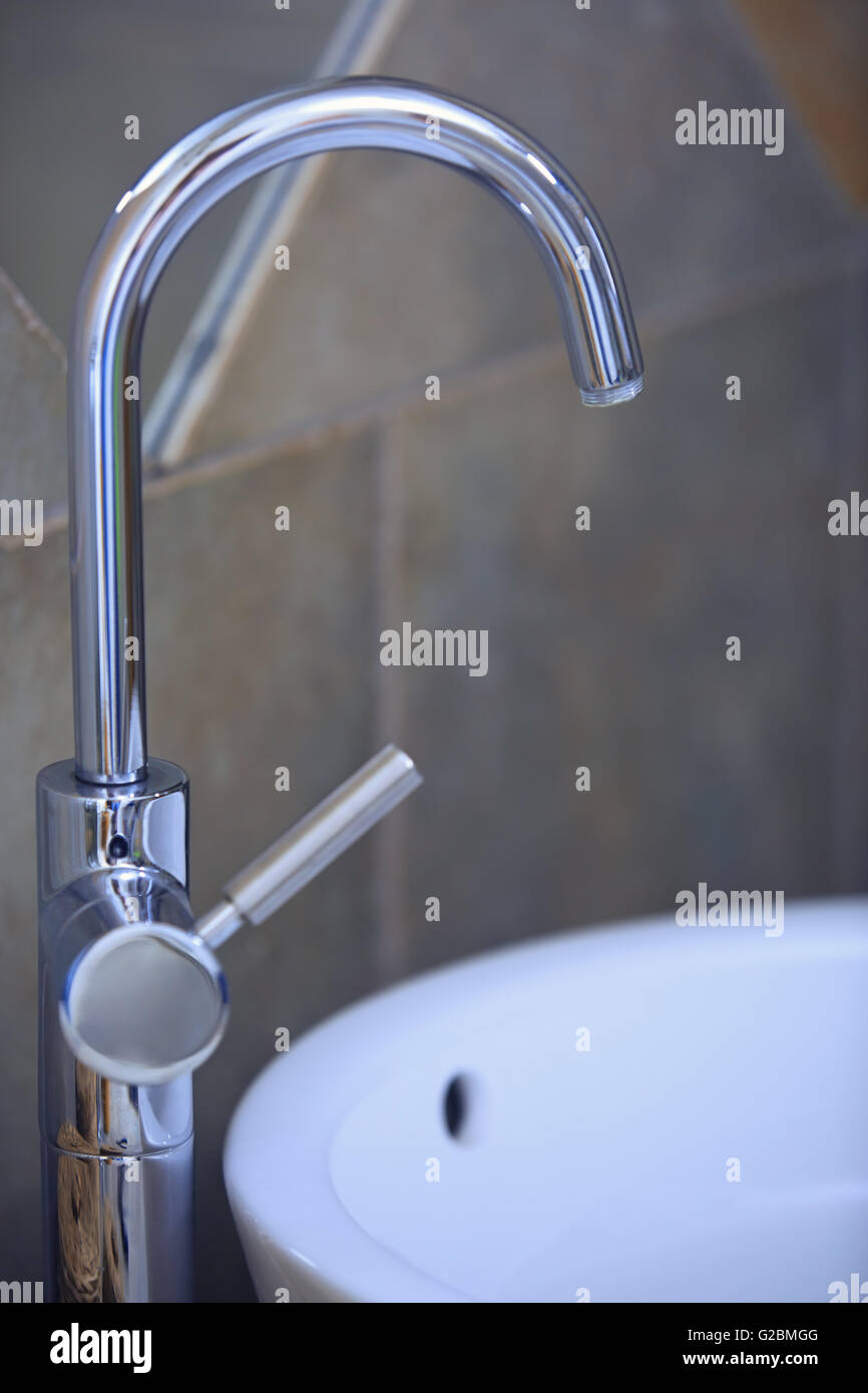 Water tap and sink in domestic bathroom Stock Photo - Alamy