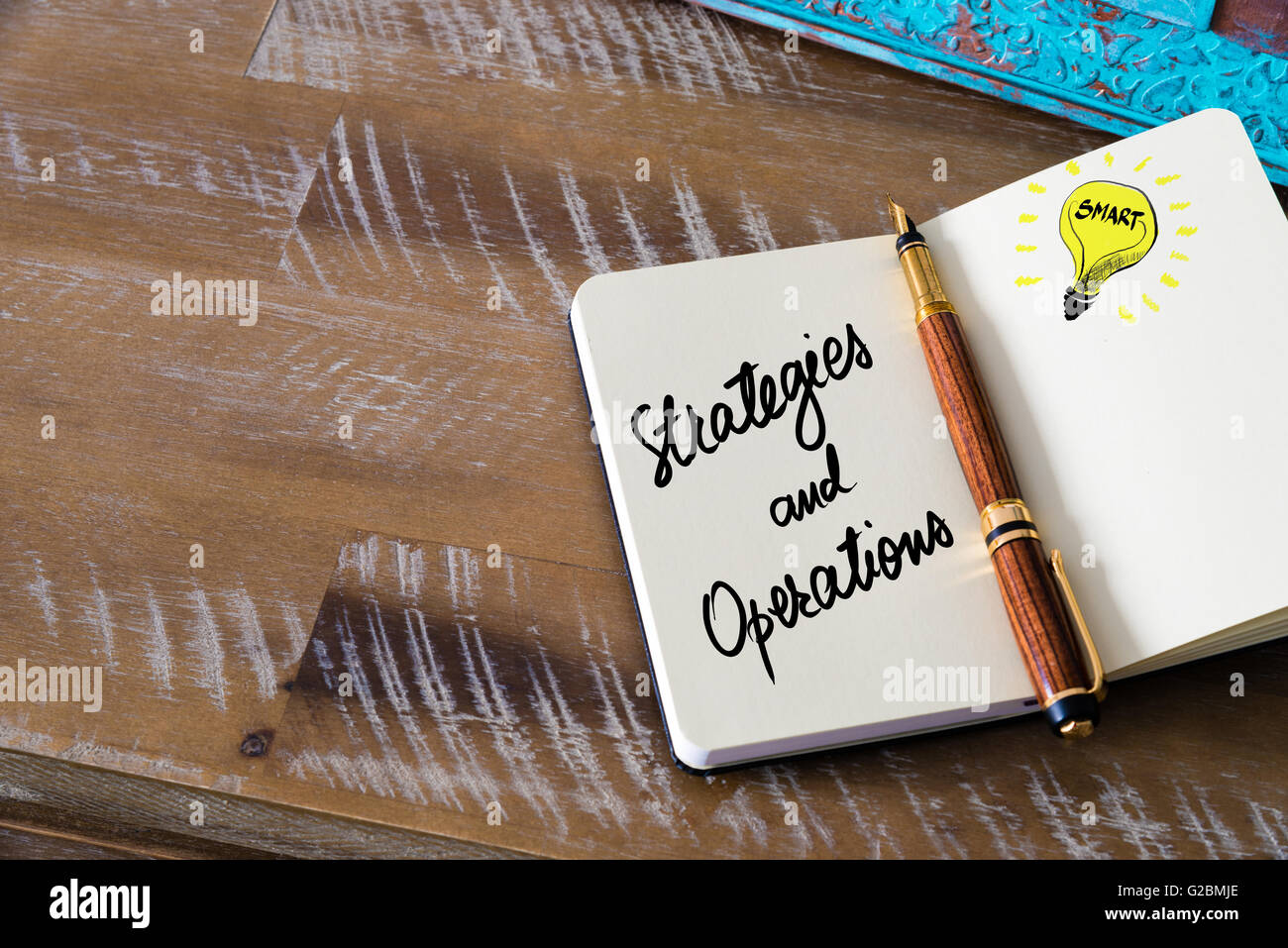 Handwritten text Strategies and Operations with fountain pen on ...