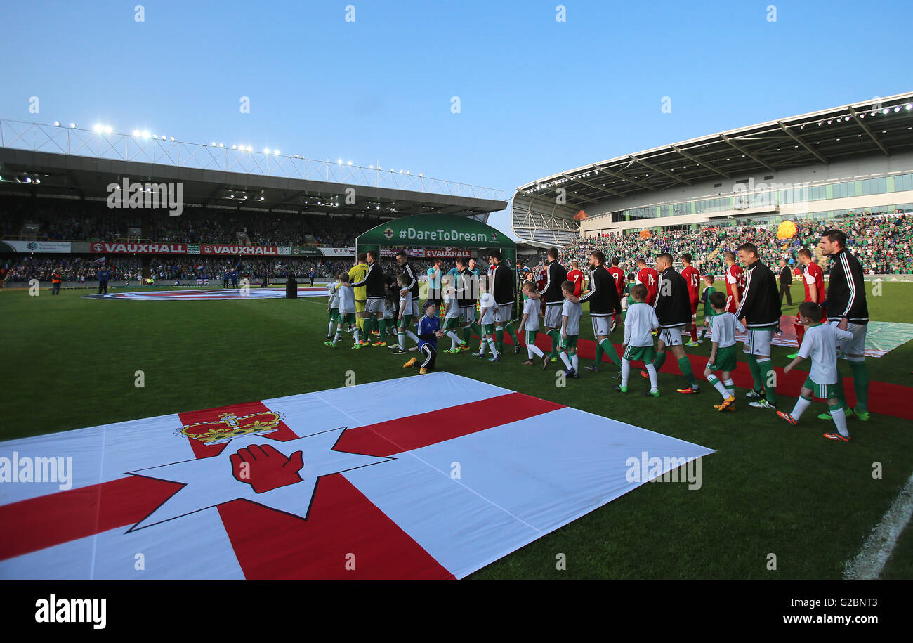 Northern Ireland and Belarus players walk onto the pitch before the International Friendly at Windsor Park, Belfast. Stock Photo
