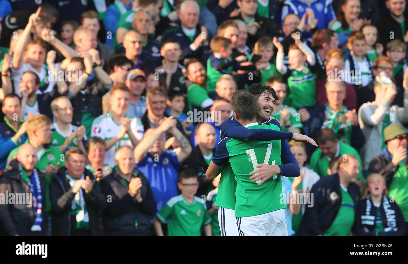 Northern Ireland's Kyle Lafferty (right) celebrates with Stuart Dallas after scoring his side's first goal during the International Friendly at Windsor Park, Belfast. Stock Photo