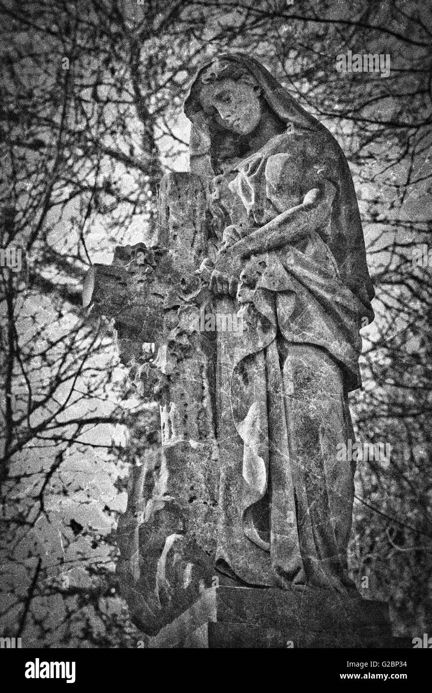 Damaged and fallen old graves and headstones in an Ancient Burial ground Stock Photo