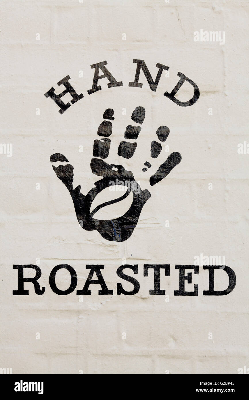 Hand roasted sign on a wall Stock Photo Alamy