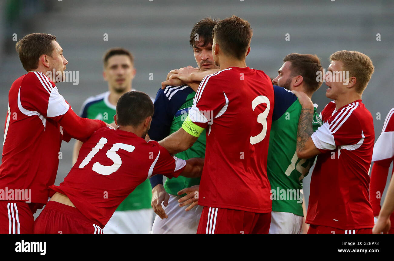 Northern Ireland's Kyle Lafferty and Belarus' Sergey Kislyak (15) confront each other during the International Friendly at Windsor Park, Belfast. Stock Photo
