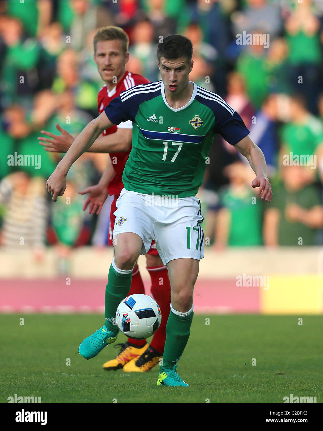 Northern Ireland's Paddy McNair battle for the ball during the International Friendly at Windsor Park, Belfast. Stock Photo