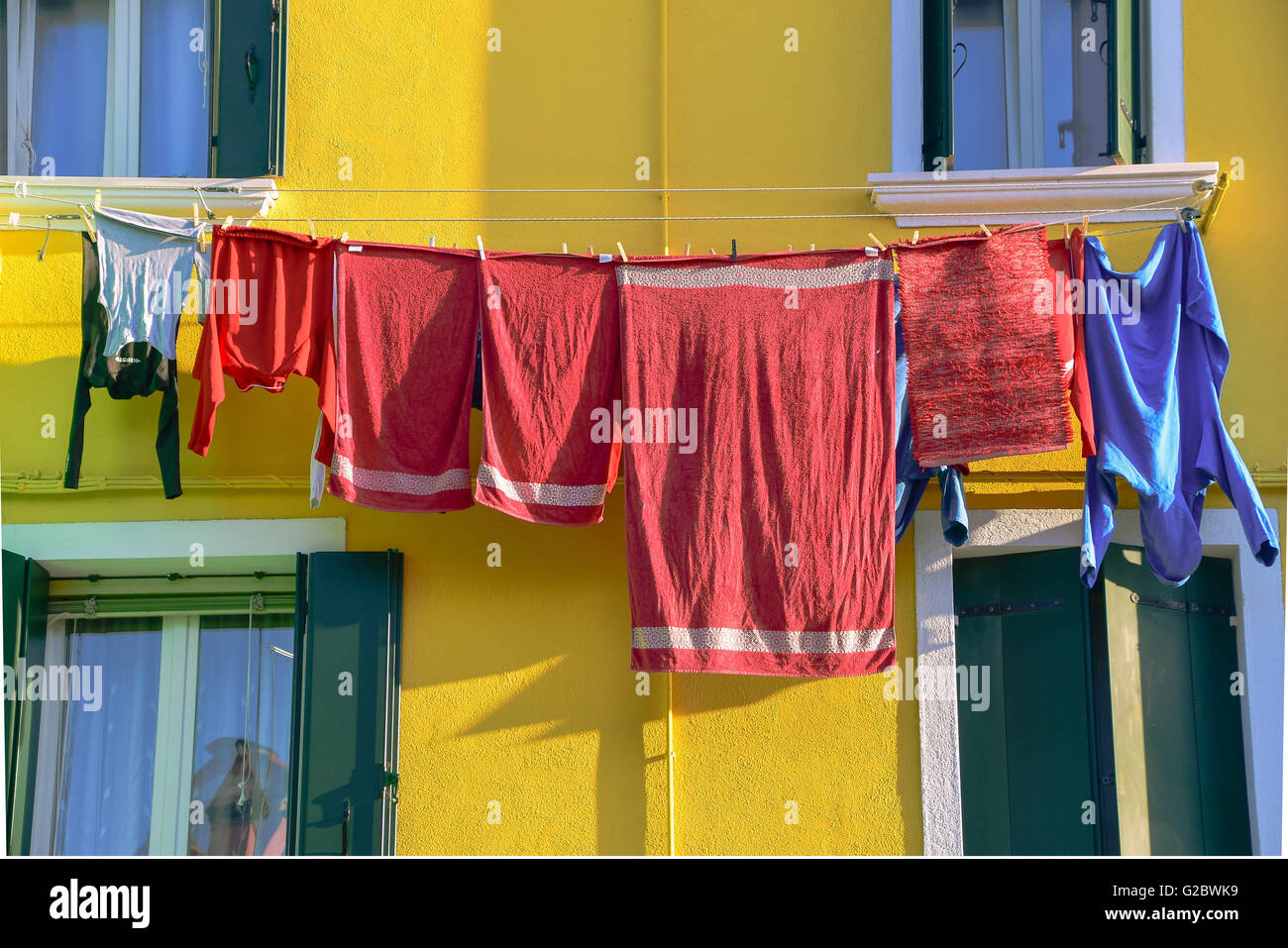 Drying laundry in the colourful Burano, Venice Stock Photo Alamy