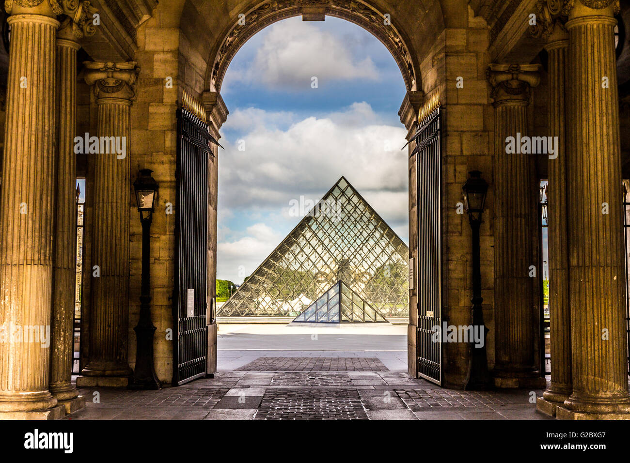 Louvre Pyramid in Paris Stock Photo