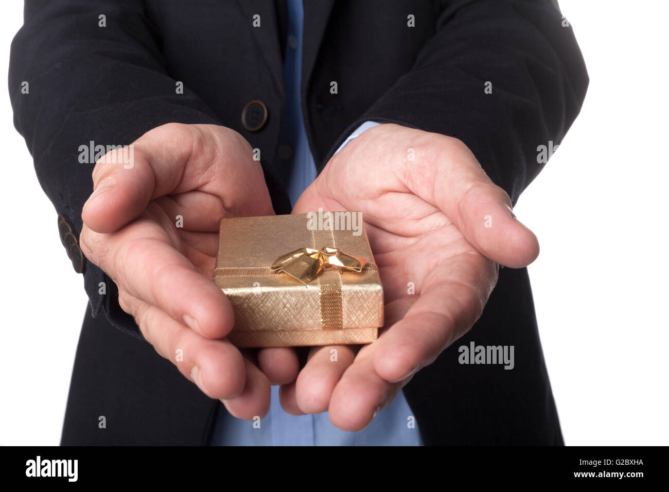 Man Hand in Suit Holding Golden Jewelry Box Isolated on White Background Stock Photo