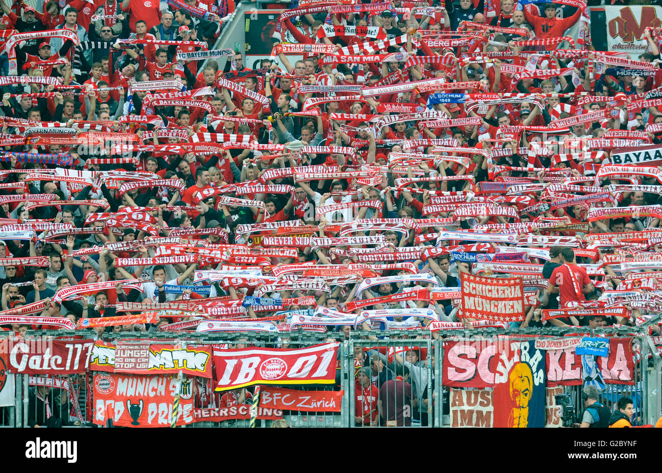 Bayern fans displaying their scarves, Bayer Leverkusen - FC Bayern Muenchen, 1:1, Leverkusen, North Rhine-Westphalia, Germany Stock Photo
