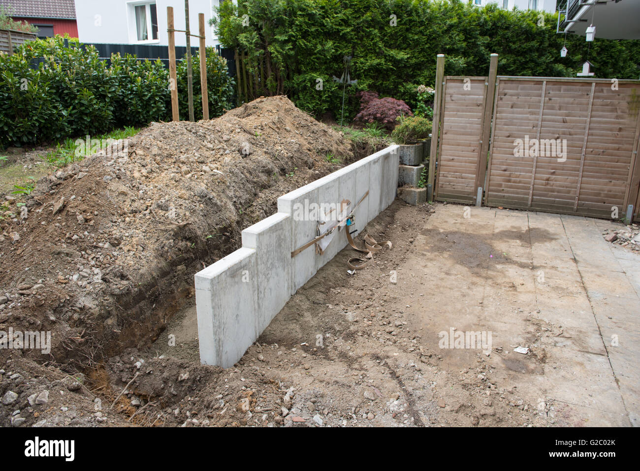 building a new garden with stones, fences and trees Stock Photo